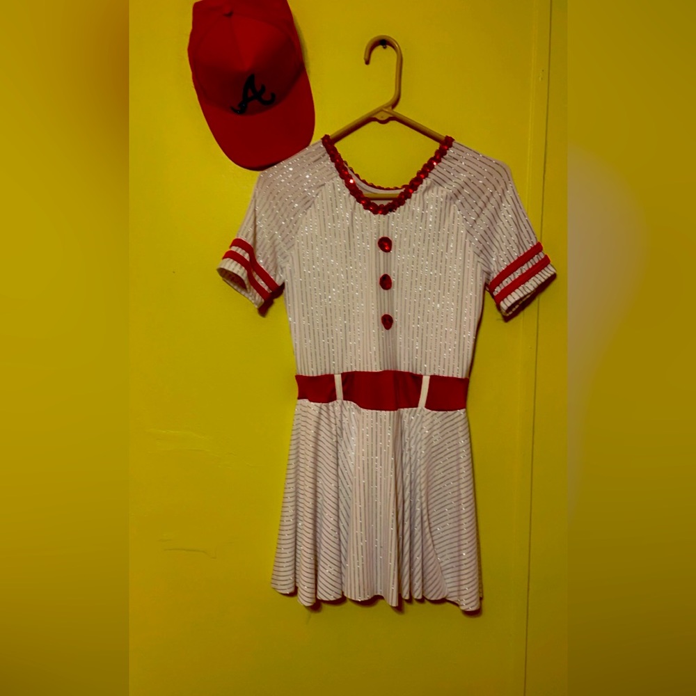 Red and white baseball dance costume. Comes with a hat and a red petit coat